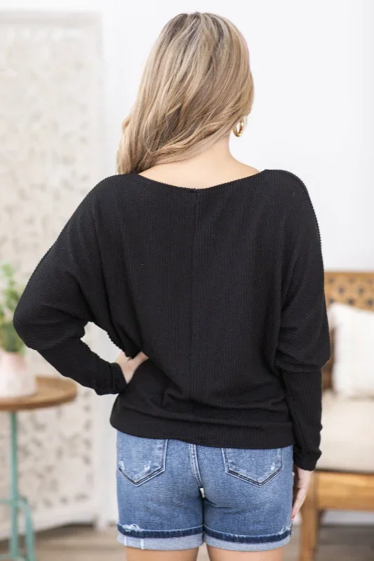 black-ribbed-dolman-sleeve-knit-top