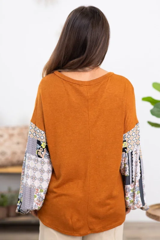 burnt-orange-top-with-paisley-print-sleeves